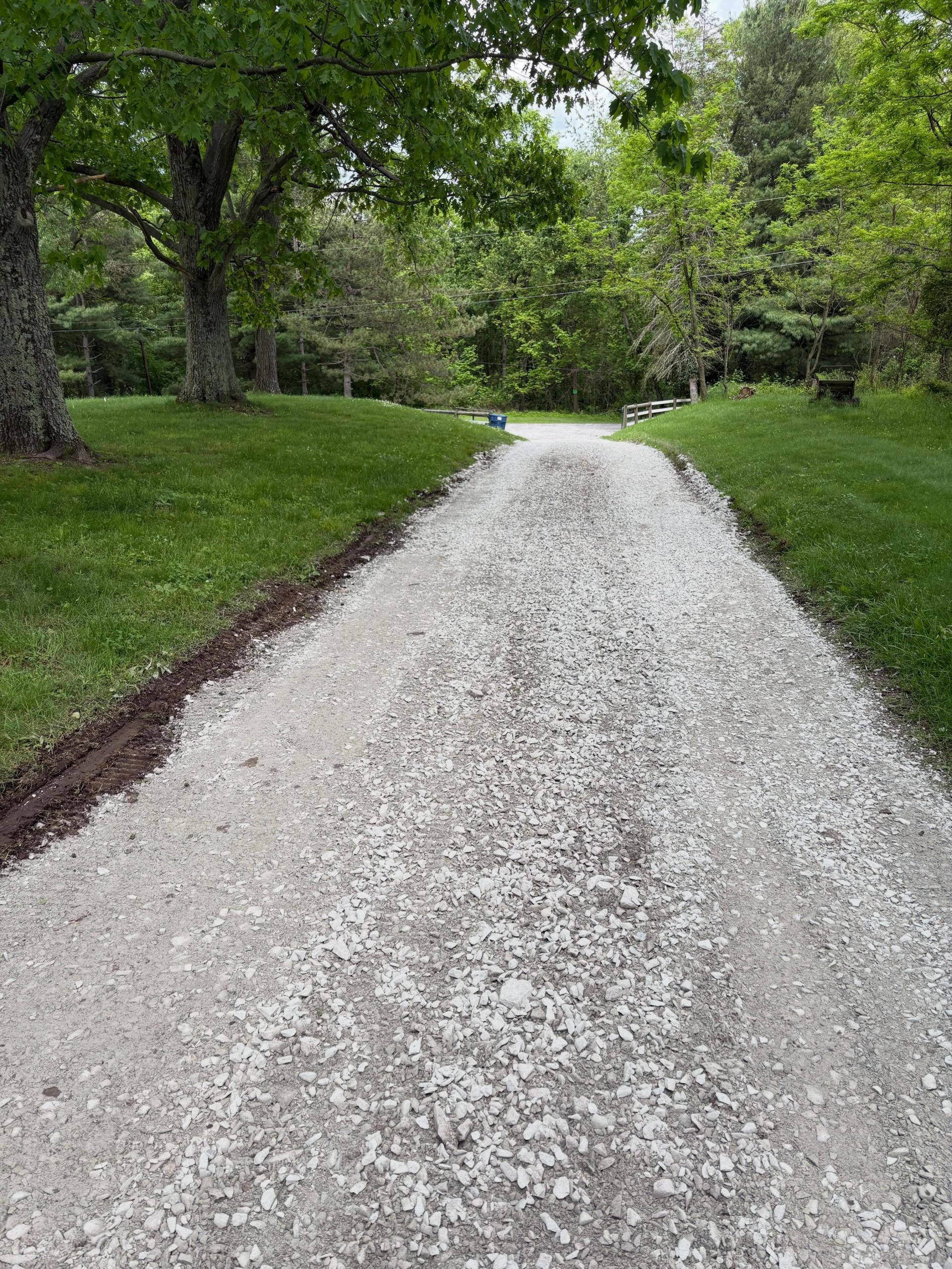 Regraded gravel driveway with fresh stone